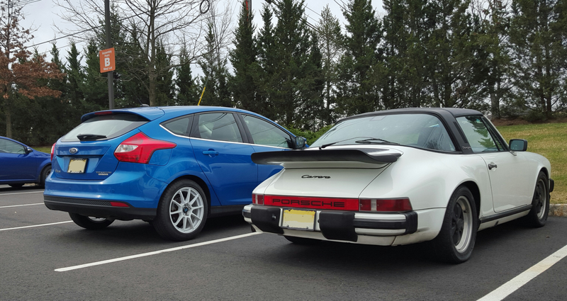 There is also a Porsche 911 in this picture.